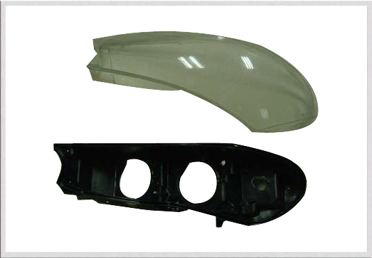 Lens and housing